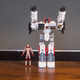 Illustration for article titled The Biggest Transformer Ever, Standing Next to Stuff